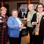 Faculty members enjoy post-convocation food and drinks together